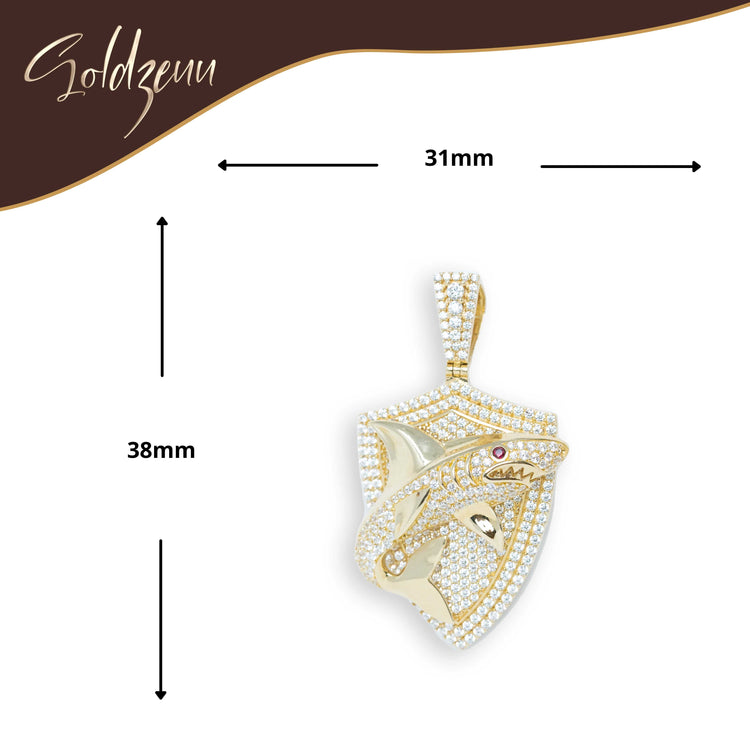 Shark Pendant in 10k Gold with CZ – Men’s Gold Pendant. Shaped like a shield with a detailed fish design, measures 38mm x 31mm, and features the Soldzeuu logo in the top left corner.
