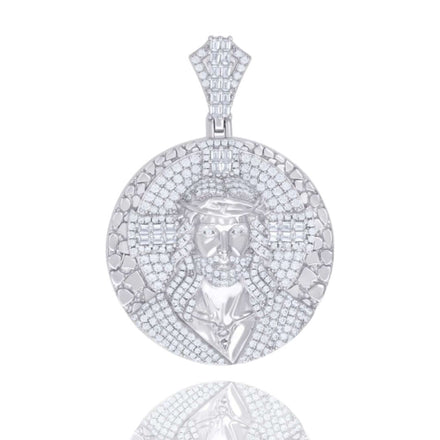 The Silver Round Baguette Moissanite Jesus Charm Pendant features a bearded man crowned with thorns, crafted in 925 sterling silver and adorned with sparkling baguette moissanite stones on a textured backdrop.