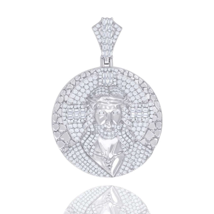 The Silver Round Baguette Moissanite Jesus Charm Pendant features a bearded man crowned with thorns, crafted in 925 sterling silver and adorned with sparkling baguette moissanite stones on a textured backdrop.