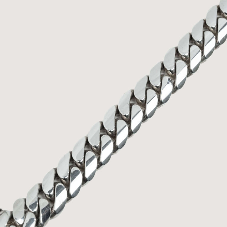 Close-up of the Handmade Miami Cuban Link Bracelet in 950 Silver with tightly interlocking, flat, polished links against a plain light background—ready to ship.