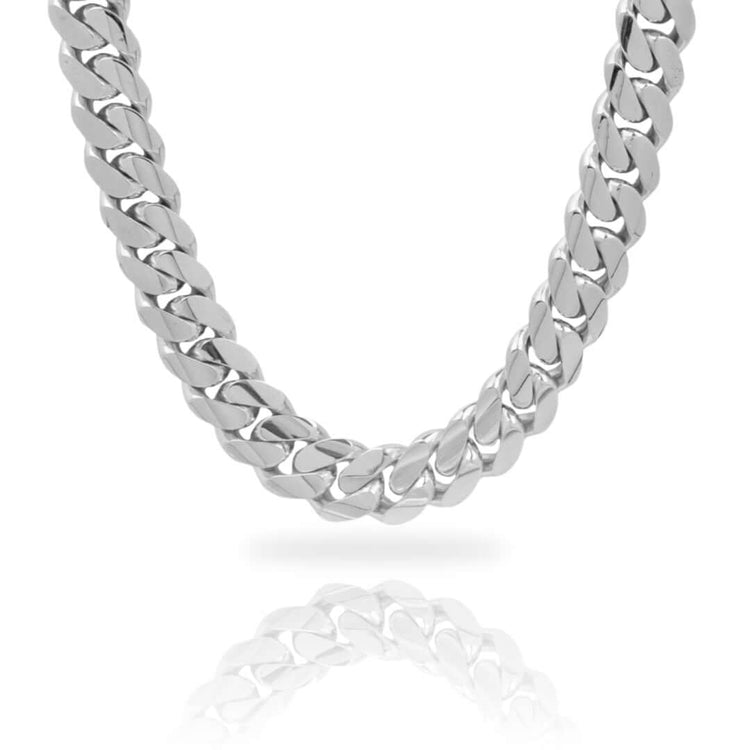 A close-up of the 20mm Handmade Miami Cuban Link Chain in 950 Silver, highlighting its thick, handcrafted links and their reflection against a white background.
