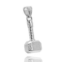 The Silver Hammer Pendant is a stylized silver hammer with detailed engravings on the handle and head, plus a decorative loop for attaching to a chain—a striking piece of craftsmanship jewelry.