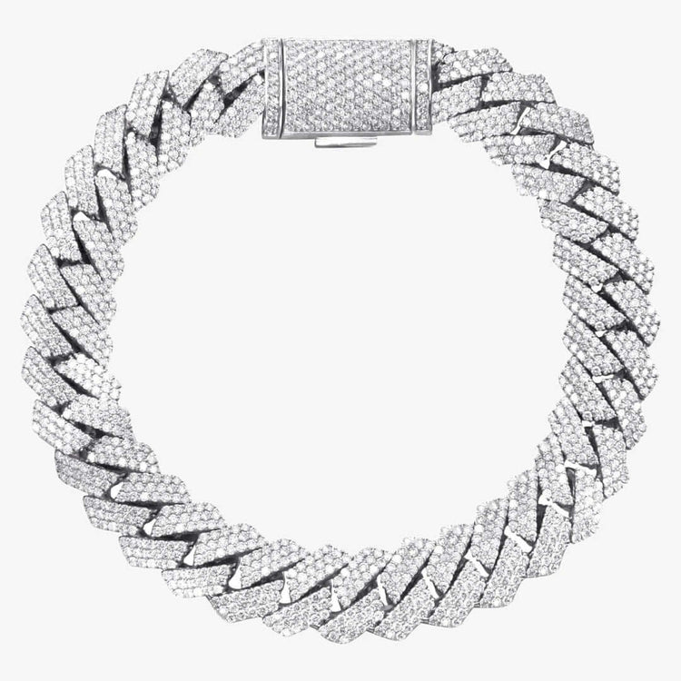 The Silver Moissanite Cuban Link Bracelet – 15mm features a thick, diamond-encrusted design with a large rectangular clasp, showcased on a white background.