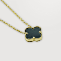The 1 Leaf Clover Bracelet in 14k Yellow Gold features a clover charm with a textured border—an elegant accessory to bring luck and style to your look. Displayed on a plain white background.