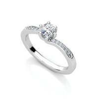 The Six-Prong Round Lab Diamond Solitaire Engagement Ring with Pave Accents features a round brilliant lab diamond center and pavé accents on the band, crafted in white gold and displayed against a white background.