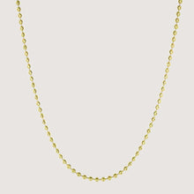  Alt="gold chain featuring moon cut bead design for a textured look."