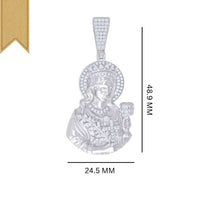 The Moissanite St. Barbara Charm Pendant is crafted in 925 sterling silver, featuring a detailed figure with a halo, cup, and branch, accented by sparkling stones. It measures 48.9 mm tall by 24.5 mm wide and has a gold ribbon detail at the top left corner.
