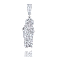 The Silver Baguette Moissanite St. Jude Pendant features a detailed robed figure standing upright, sparkling with baguette-cut moissanite and a radiant halo on its textured sterling silver surface.