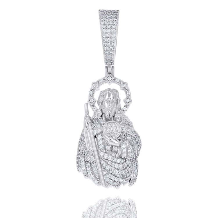 The Classic Moissanite St. Jude Charm Pendant in 925 sterling silver features a robed figure holding a staff and medallion, with VVS moissanites and a jeweled halo, set on a white background.