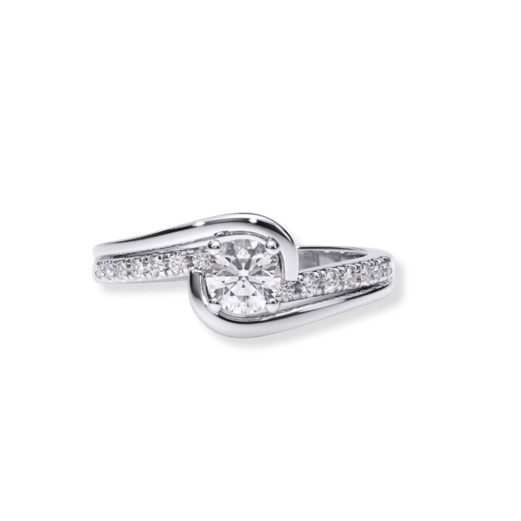 The Swirl Pavé Round-Cut Lab Diamond Engagement Ring features a unique twisted silver band adorned with pavé-set lab diamonds and a central round-cut diamond.