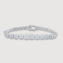  Tennis Bracelet with 7CTW natural diamonds in 14k white gold. The diamonds in this piece are ethically sourced. | GOLDZENN 