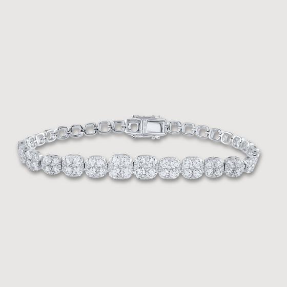 Tennis Bracelet with 7CTW natural diamonds in 14k white gold. The diamonds in this piece are ethically sourced. | GOLDZENN 