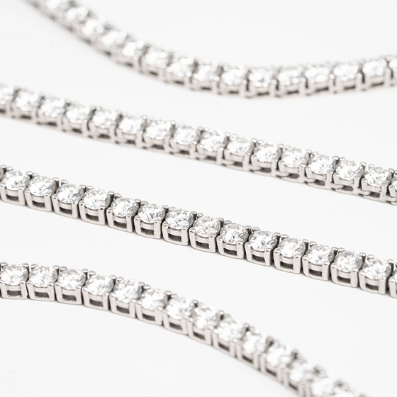 alt=" 925 sterling silver tennis bracelet with D color, VVS moissanite stones. Rhodium-plated, brilliant, and ethically crafted for timeless sophistication. "