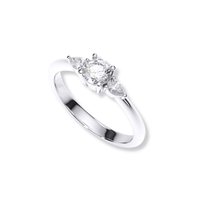 The Three-Stone Round Lab Diamond Ring with Pear-Cut Side Stones features a round lab diamond center and two pear-shaped side stones, set in white gold or platinum, displayed on a white background.