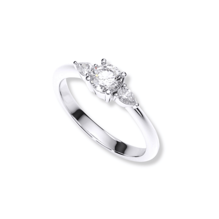 The Three-Stone Round Lab Diamond Ring with Pear-Cut Side Stones features a round lab diamond center and two pear-shaped side stones, set in white gold or platinum, displayed on a white background.