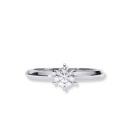 The Timeless Six-Prong Solitaire Lab Diamond Ring features a single round-cut lab diamond in a classic six-prong setting, displayed on a white background—an elegant, enduring choice for a women's engagement ring.