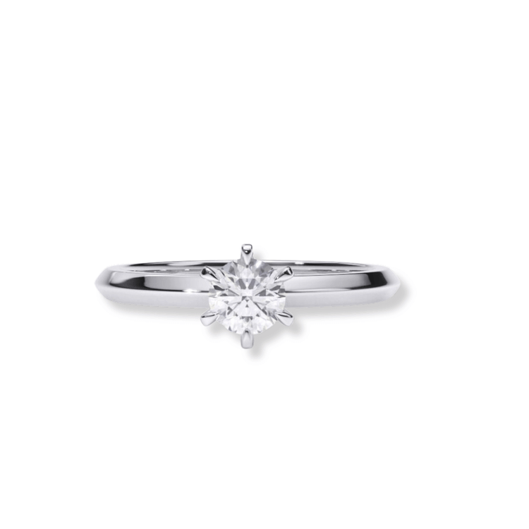 The Timeless Six-Prong Solitaire Lab Diamond Ring features a single round-cut lab diamond in a classic six-prong setting, displayed on a white background—an elegant, enduring choice for a women's engagement ring.