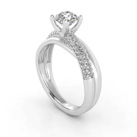 The Triple Row Pavé Band Lab Diamond Engagement Ring features a round lab diamond center held by four prongs, with sparkling pavé-set accent diamonds along the white gold band, shown on a white background.