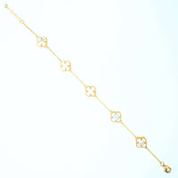 The 5 Leaf Clover Bracelet in 14k yellow gold features six evenly spaced clover-shaped charms with hollow centers and a lobster clasp, elegantly displayed on a white background.
