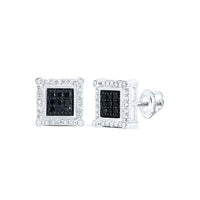 The 10K White Gold Black Diamond Square Earrings (1/4 CTTW) feature black diamond clusters at the center, surrounded by clear stones and set in shiny white gold with secure screw-back closures.
