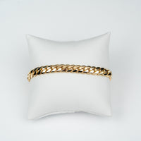 8mm handmade Miami Cuban link bracelet in solid yellow gold, showing the tight, hand-finished Cuban link work.