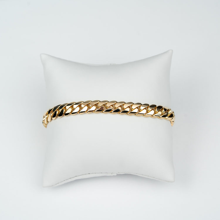8mm handmade Miami Cuban link bracelet in solid yellow gold, showing the tight, hand-finished Cuban link work.