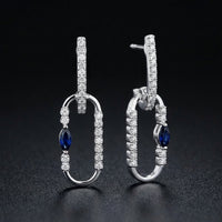 14K White Gold Diamond Paper Clip Dangle Earrings three-quarter view - GOLDZENN