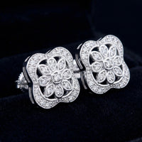 Sterling Silver Diamond Flower Earrings 1/8 Cttw three-quarter view - GOLDZENN