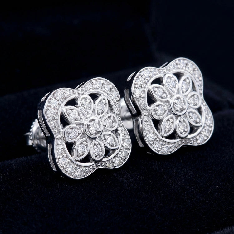 Sterling Silver Diamond Flower Earrings 1/8 Cttw three-quarter view - GOLDZENN