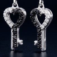 10k White Gold Black Diamond Key Heart Earrings three-quarter view - GOLDZENN