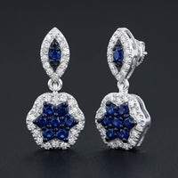 1/3CTW Diamond Flower Dangling Earrings 10k White Gold three-quarter view - GOLDZENN