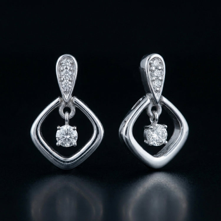 1/10CT Natural Diamond Earrings in Sterling Silver three-quarter view - GOLDZENN
