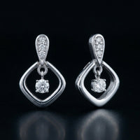 1/10CT Natural Diamond Earrings in Sterling Silver three-quarter view - GOLDZENN