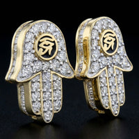 10k Gold Baguette Diamond Hamsa Eye Earrings three-quarter view - GOLDZENN