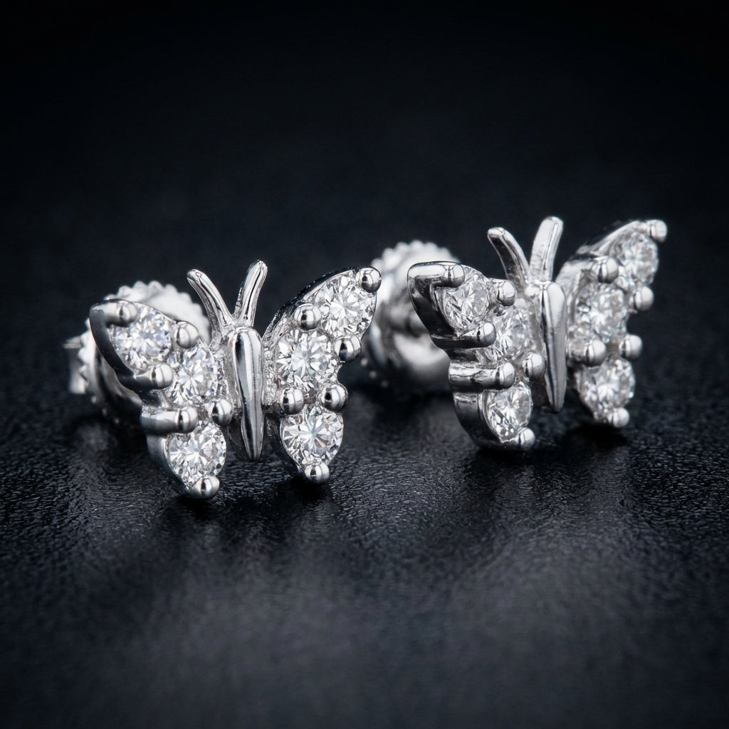 10k White Gold Diamond Butterfly Earrings 1/5 Cttw three-quarter view - GOLDZENN