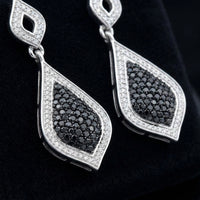 10K White Gold Black Diamond Dangle Earrings 2 CTTW three-quarter view - GOLDZENN