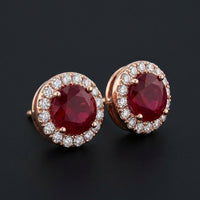 1-1/5CTW Round Ruby Halo and Diamond Solitaire Stud Earrings - 14K Rose Gold three-quarter view - GOLDZENN