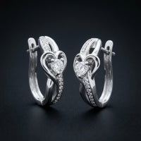 1/12 CTW Natural Diamond Heart Hoop Earrings three-quarter view - GOLDZENN