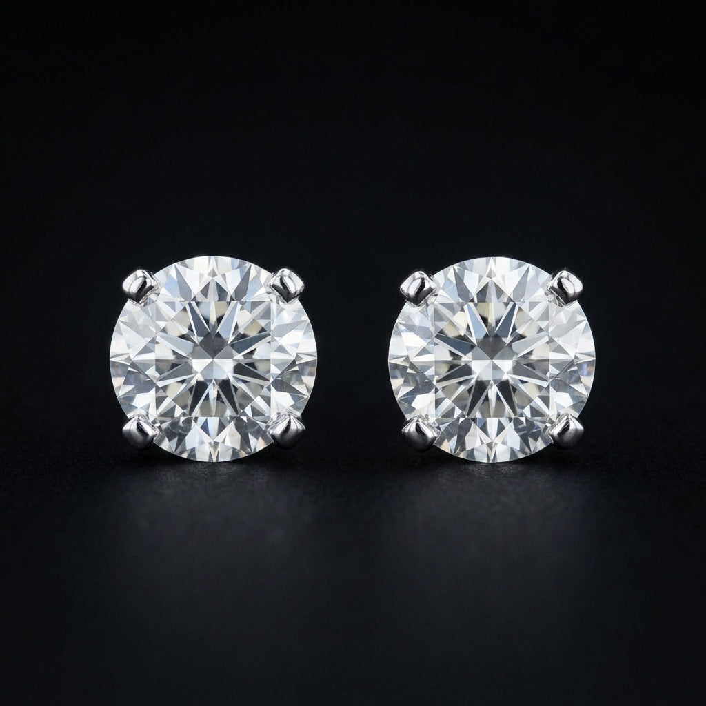 14k White Gold Diamond Solitaire Earrings 1/5 Cttw three-quarter view - GOLDZENN