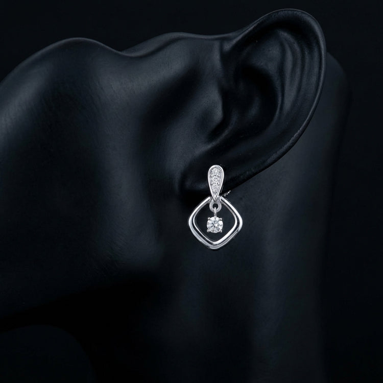 1/10CT Natural Diamond Earrings in Sterling Silver displayed on ear - GOLDZENN