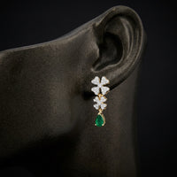 3/8CTW Natural Diamond Flower Earrings 14k Yellow Gold displayed on ear - GOLDZENN