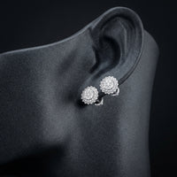 14k White Gold Diamond Halo Cluster Earrings 1 Cttw displayed on ear - GOLDZENN
