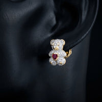1/2CTW Teddy Bear Diamond Earrings in 10K Gold displayed on ear - GOLDZENN