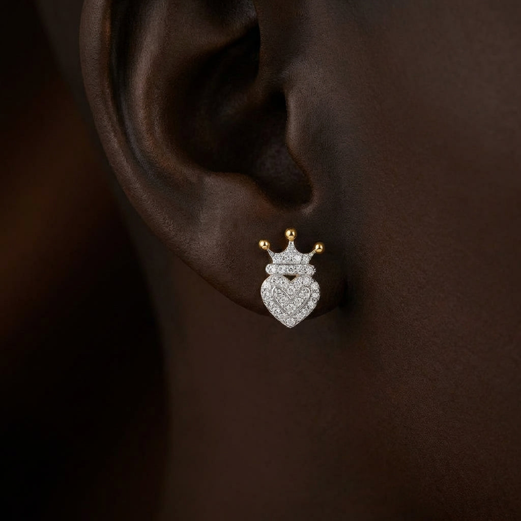 10k Gold Diamond Crown Heart Earrings 1/6 Cttw displayed on ear - GOLDZENN