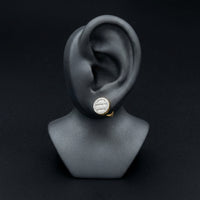 10k Yellow Gold Baguette Diamond Cluster Earrings displayed on ear - GOLDZENN