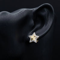 1/4CTW Natural Diamond Star Earrings 10K Yellow Gold displayed on ear - GOLDZENN