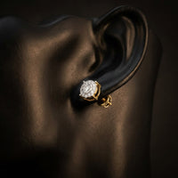 10k Gold Round Diamond Cluster Earrings 1/3 Cttw displayed on ear - GOLDZENN