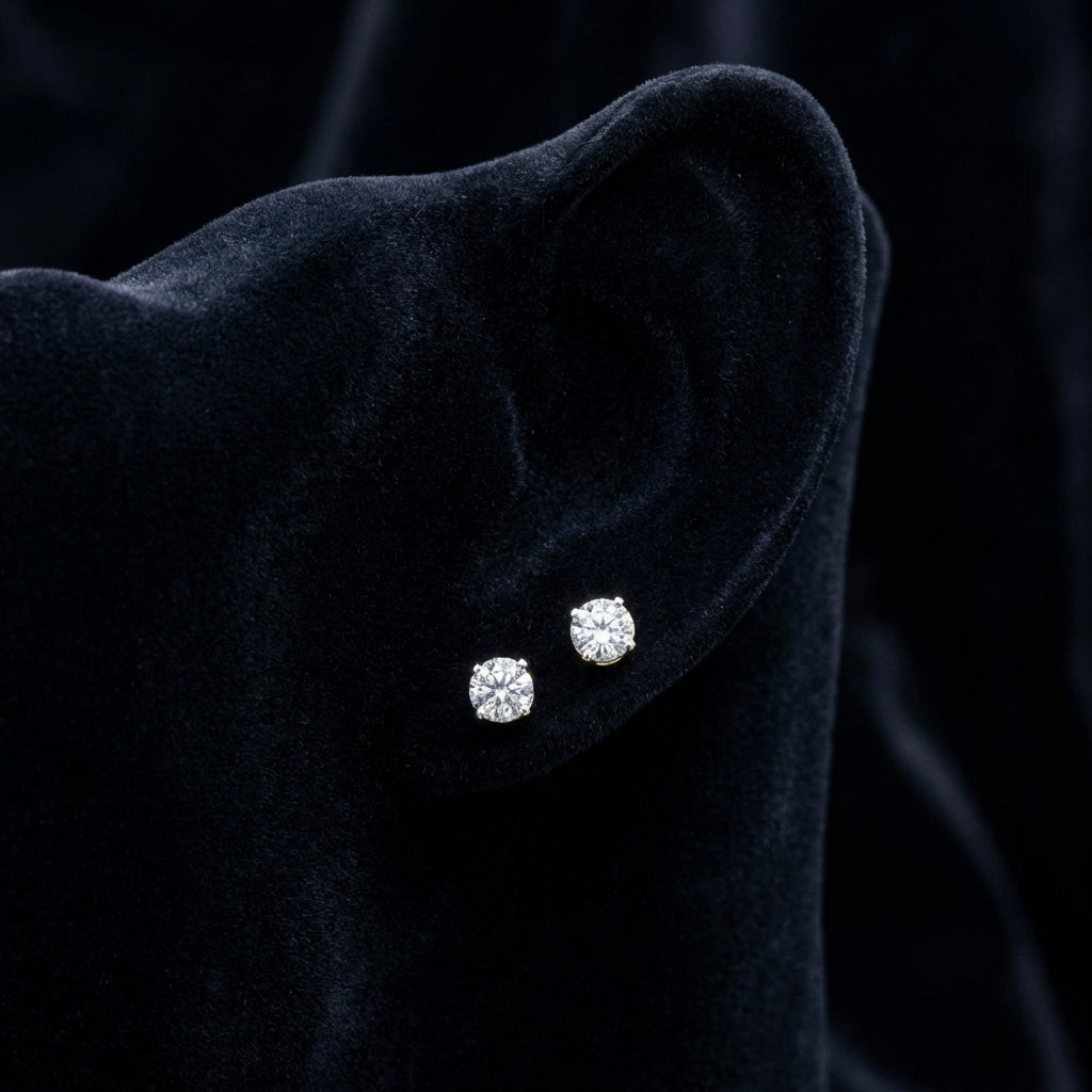 14k Yellow Gold Diamond Solitaire Stud Earrings 3/8 Cttw displayed on ear - GOLDZENN