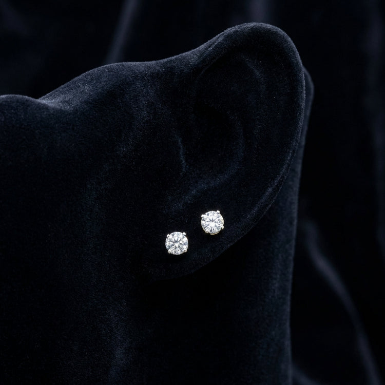 14k Yellow Gold Diamond Solitaire Stud Earrings 3/8 Cttw displayed on ear - GOLDZENN