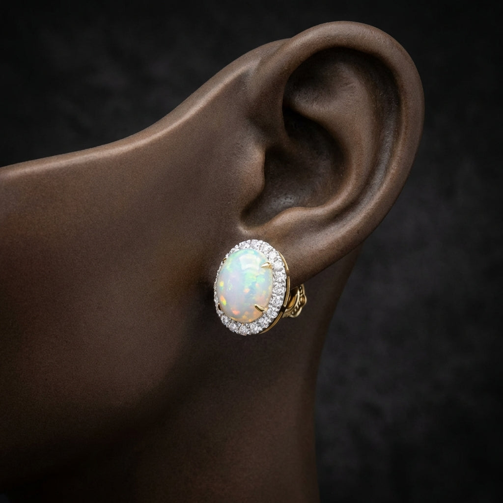 10k Yellow Gold Oval Opal Diamond Earrings 3/8 Cttw displayed on ear - GOLDZENN